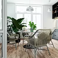 Modern Kitchen Interior With Gray Cabinets White Tile Backsplash Round Dining Table And Green Plants