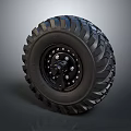 Heavy Duty Off Road Tire With Deep Tread Pattern And Black Steel Wheel