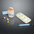 Various Medical Supplies Including Pill Bottle Blister Pack Capsules And Syringe