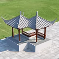 Traditional Chinese Pergola with Gray Tiled Roof Overhanging Eaves and Brown Pillars on Green Lawn