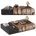 Modern Coffee Table With Black Marble And Wooden Top And Books Bowl Lamp On Surface