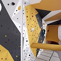 Sports Equipment Indoor Climbing Wall With Colorful Holds And People Climbing