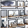 Modern Geometric Frame Bookcase With Decorative Coral Vases Glass Jars Baskets And Plants
