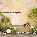 Artistic Installation With Floral Arrangement Green Plants White Spherical Lights And Stone Steps
