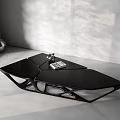 Black Modern Geometric Coffee Table With Sleek Design And Decorative Accent