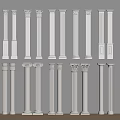 White Decorative Columns With Various Designs Displayed Against Gray Wall And Wooden Floor