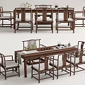 Traditional Chinese Wooden Tea Table And Chairs With Cushioned Seats And Tea Decor