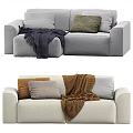 Cream And Light Gray Two Seater Sofa With Colorful Pillows And Soft Blankets