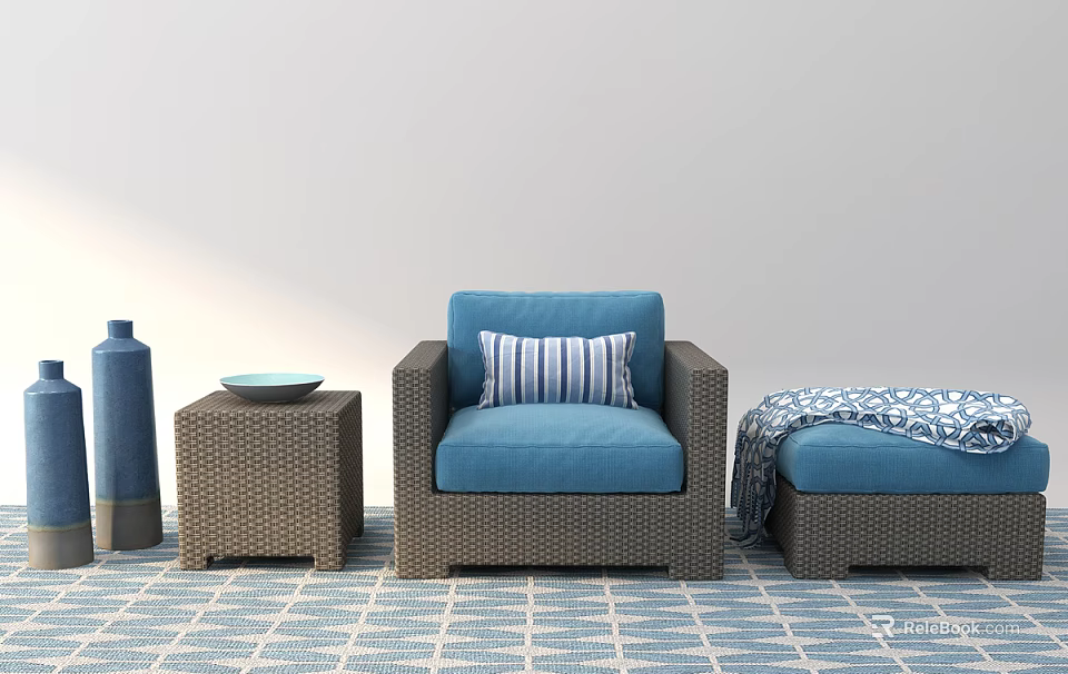 Blue Wicker Sofa Set Featuring Striped Cushion Ottoman And Patterned Throw On Geometric Rug 3d model