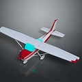 Small Model Airplane With White Wings Red Tail And Green Cockpit Design