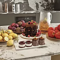 Fresh Assorted Fruits Like Lemon Apple Grape on Modern Kitchen Countertop with Chocolate Cake Desserts