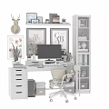 Modern Home Office Desk Chair Setup With Computer Monitor Framed Art And Bookshelf