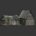 Old Wooden Houses With Weathered Wood And Sloped Roofs On Grassy Ground