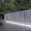 Modern Building Exterior With Glass And Wooden Grille Entrance Area And Trees