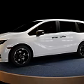 White Modern Minivan Exterior Design With Black Wheels On Display Platform 3d model