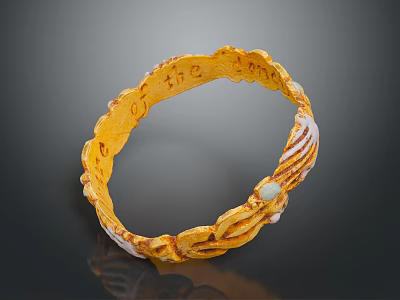 Golden Bracelet With Intricate Carved Design And Decorative White Accents 3d model