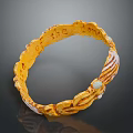 Golden Bracelet With Intricate Carved Design And Decorative White Accents