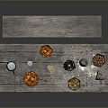 Rustic Wooden Dining Table with Lit Candle Bowls of Fruits and Food
