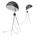 Modern Floor Lamp With Black Shade Tripod Metal Stand And Illuminated Minimalist Design