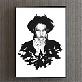 Black and White Portrait of a Woman Wearing a Hat Smoking With Feathered Coat