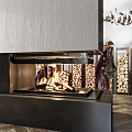 Modern Fireplace With Burning Flames Stacked Wood Logs And Wood Storage Racks