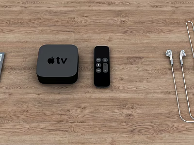 Apple TV Device with Remote Control Headphones and Laptop Accessories on Wooden Surface 3d model