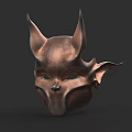 Intricate Bronze Mask Sculpture With Horns And Ornate Ear Design Elements