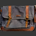 Gray Canvas Messenger Bag With Brown Leather Straps Metal Buckles And Flap Closure