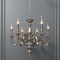Traditional Metal Chandelier With Ornate Carved Design And Candle Shaped Bulbs Against Gray Wall