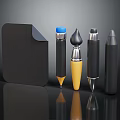 Various Types Of Pens With Yellow Accent Blue Cap And Black Notebook On Reflective Surface