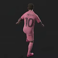 Man In Pink Soccer Jersey Juggling Soccer Ball On Dark Background