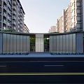 Modern Entrance Gate With Glass Metal Structure And High Rise Apartment Buildings
