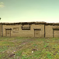 Traditional Adobe House With Thatched Roof Two Doors Several Windows And Trees On Grassland