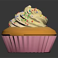 Household Dessert Cupcake With White Cream And Colorful Sprinkles In Pink Paper