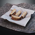 Four Golden Crispy Spring Rolls on White Paper Towel Granite Table 3d model