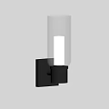Modern Wall Sconce with Transparent Glass Shade Black Fixture on Dark Wall Illuminated
