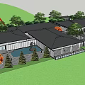 Modern Building Complex With Circular Lawn Fountain Parking Lot And Trees