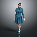 Woman Wearing Blue Dress with Braid and Blue Shoes Standing Against Gray Background