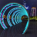 Glowing Arched Activity Passage With LED Lights And Urban Night City Skyline View