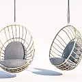 Two Stylish Rattan Hanging Chairs With Gray Cushions And Hanging Design