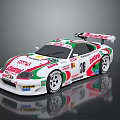 White Race Car With Green Red Stripes KITKAT FERRERO Logos And Rear Wing