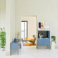 Modern Entryway Interior Featuring Console Table Side Cabinet Green Plants And Art Decor
