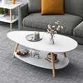 White Oval Two Tier Coffee Table With Tray Cotton Bouquet Decorations And Books With Gray Sofa