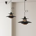 Modern Black Pendant Lights With Wooden Accents Hanging Against Light Colored Walls
