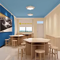 School Interior With Blue Beige Walls ROBTMAN Sign Wooden Tables And Stools