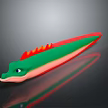 Colorful Green And Red Toy Fish With Orange Fins And Blue Eyes