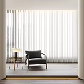 Vertical Blinds in Modern Living Space with Armchair Side Table and Wooden Floor
