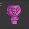 Carved Decorative Vase With Intricate Face Designs And Green Accents On Pedestal Base