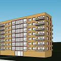 Modern Residential Apartment Building With Yellow Exterior Multiple Balconies And Windows