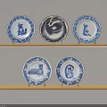Blue And White Decorative Plates On Wooden Shelves With Animal And Abstract Patterns